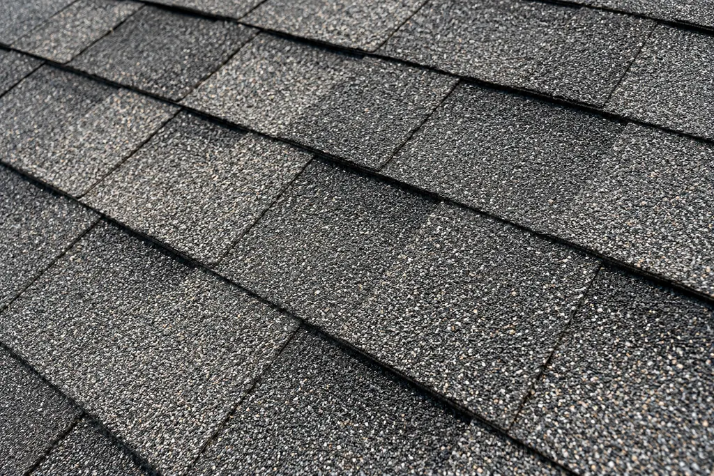 Close-up of charcoal architectural asphalt shingles